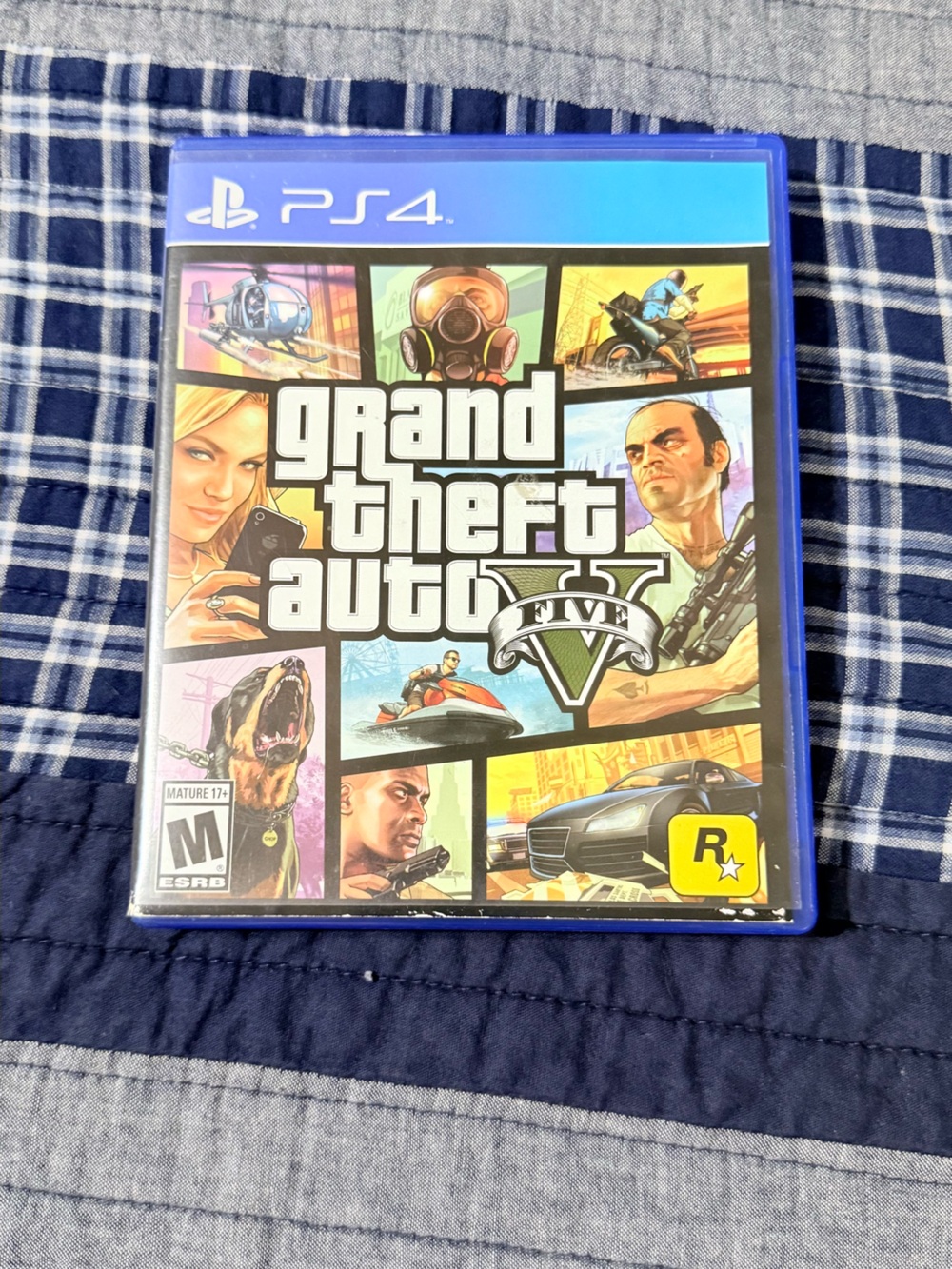 Grand Theft Auto V (PS4) – Blue Case by Rockstar Games